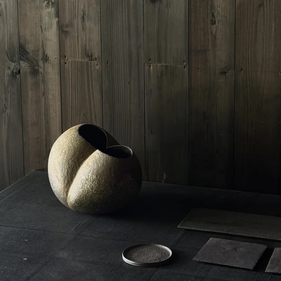 Finished ceramic pieces displayed on shelves