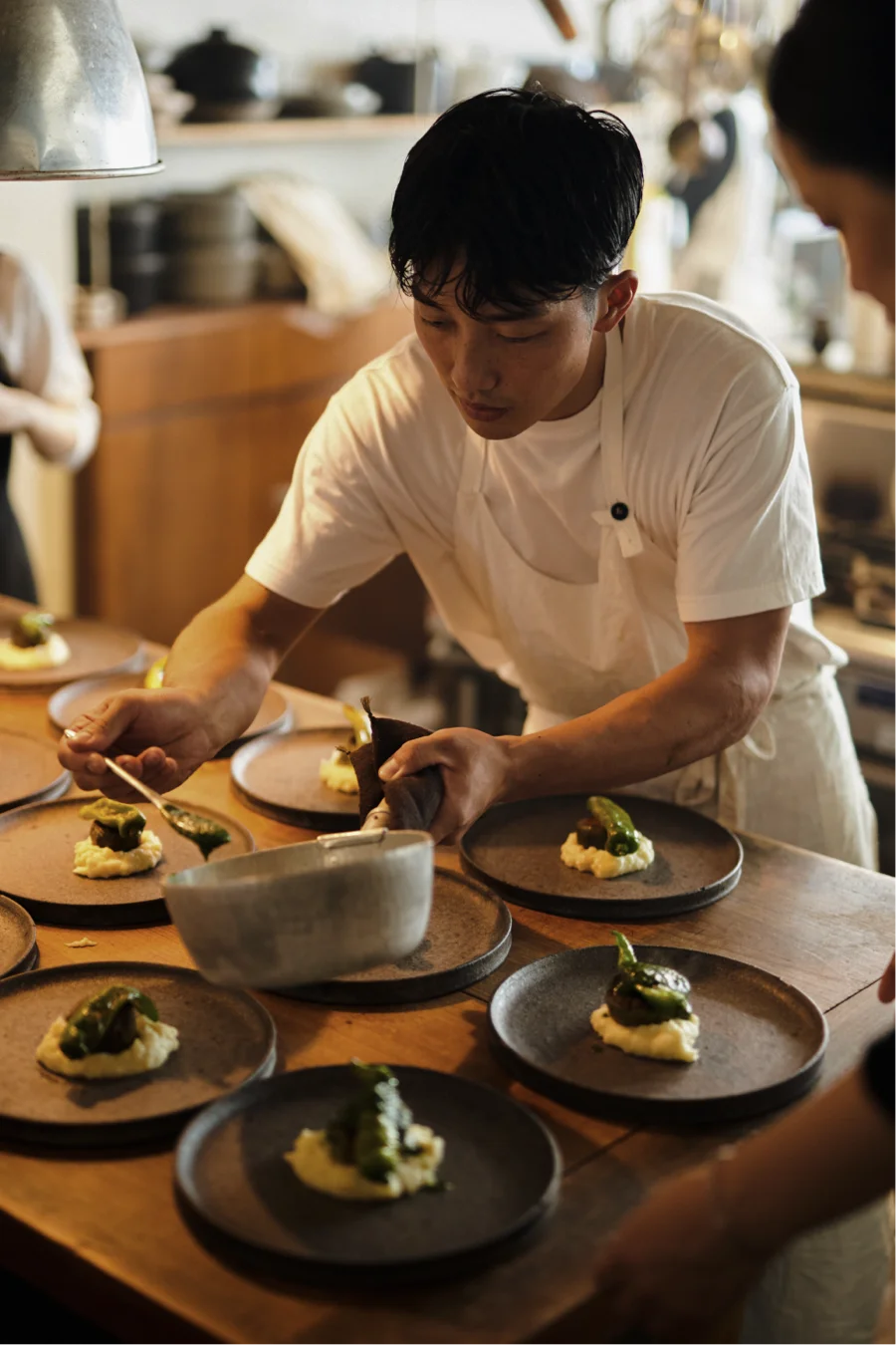 Chef preparing a Japanese meal