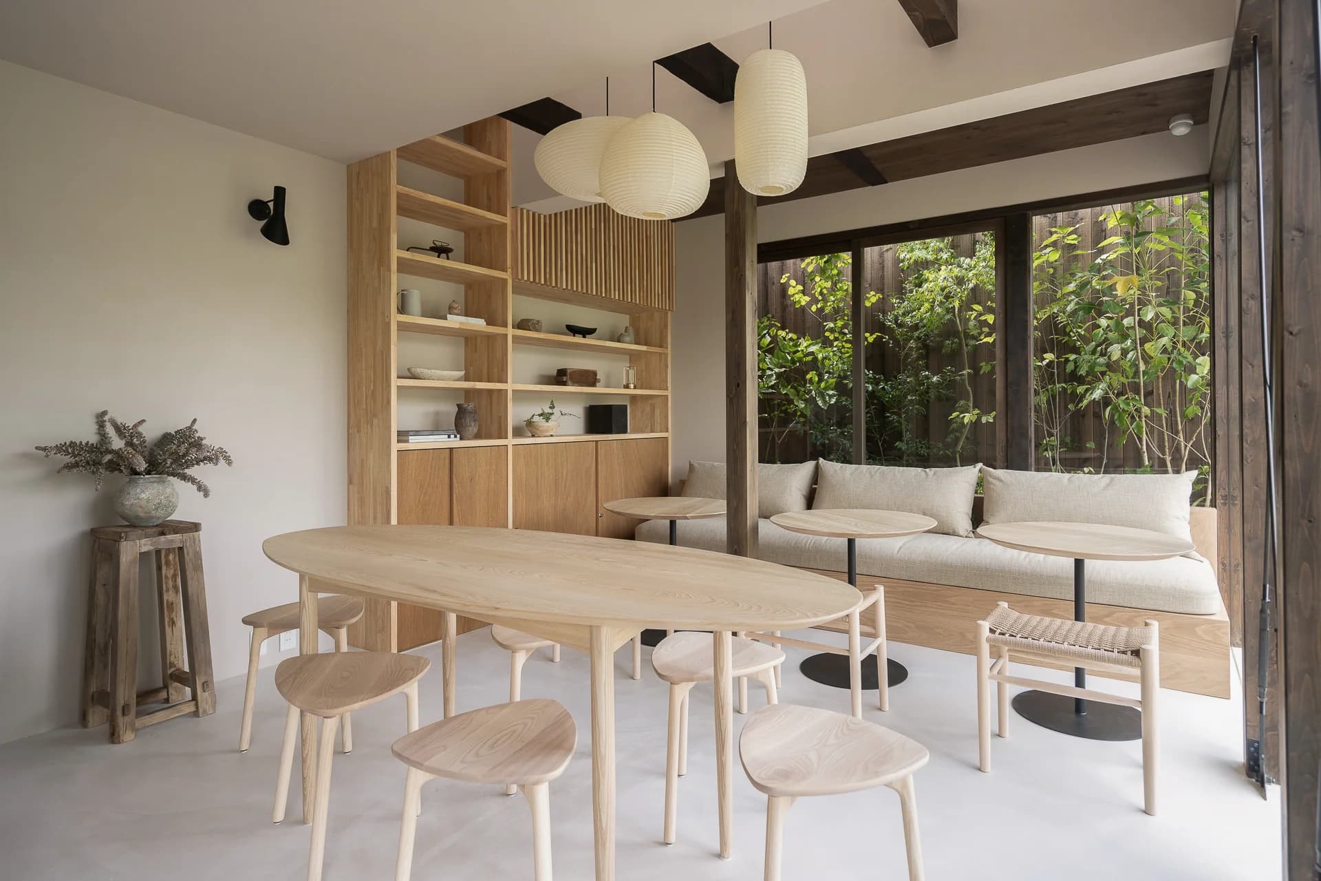 Interior of the cafe with wooden tables and chairs